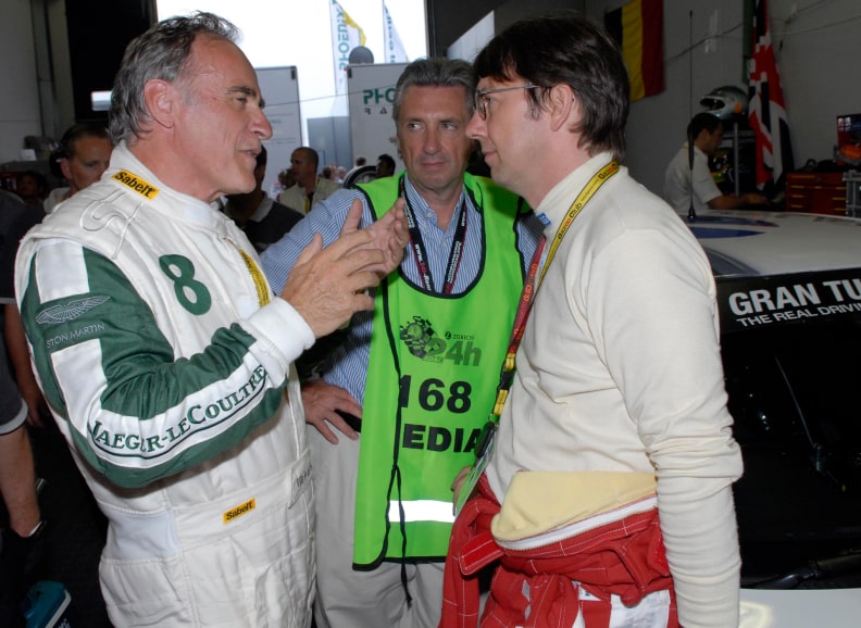 Aston Martin CEO Ulrich Bez talks with Frank Paul Janssen in box of Toyota till 24 hours of Nuerburgring