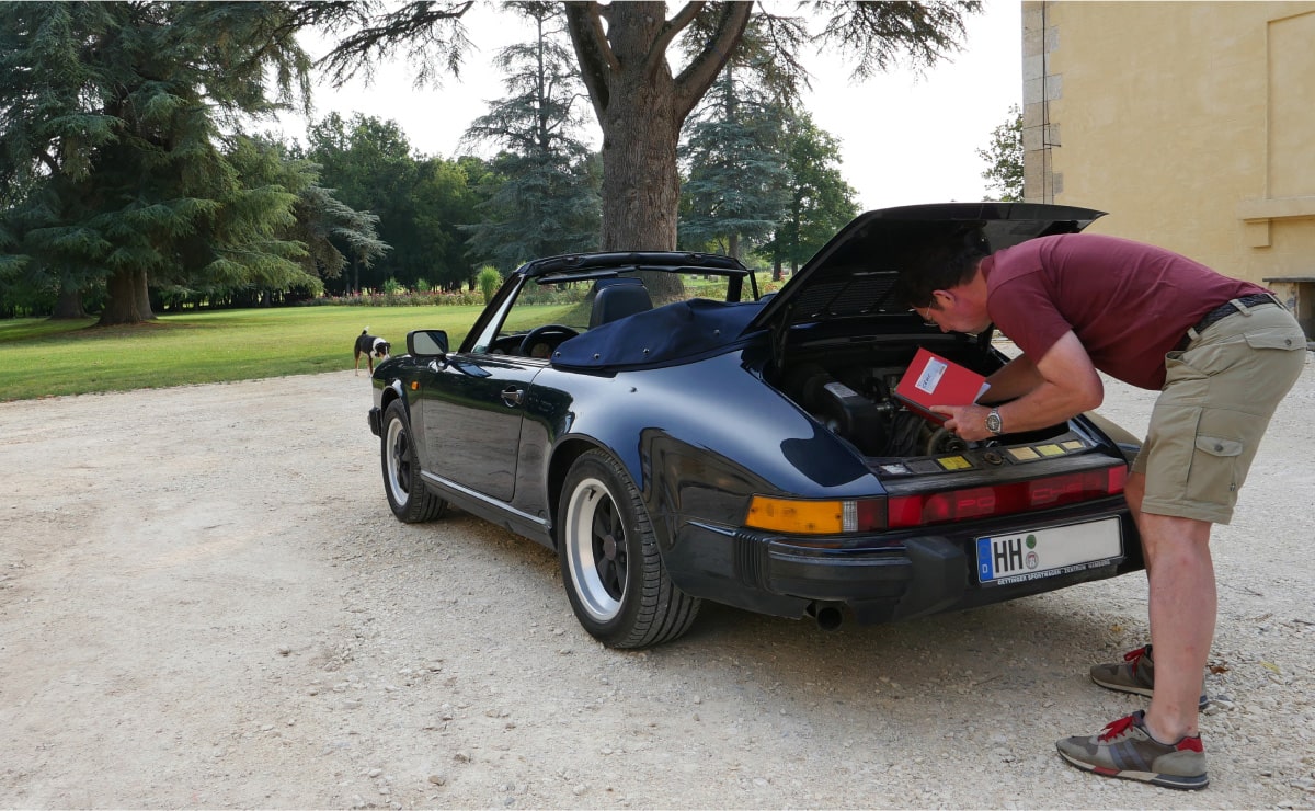 Porsche 911 Turbo rear view with open engine lid