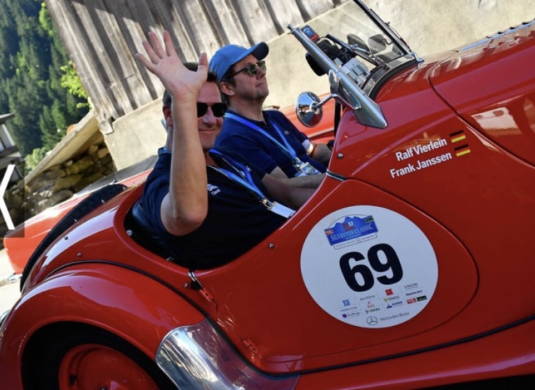 Frank Paul Janssen and his passenger at Silvretta Classic 2017 in a red car