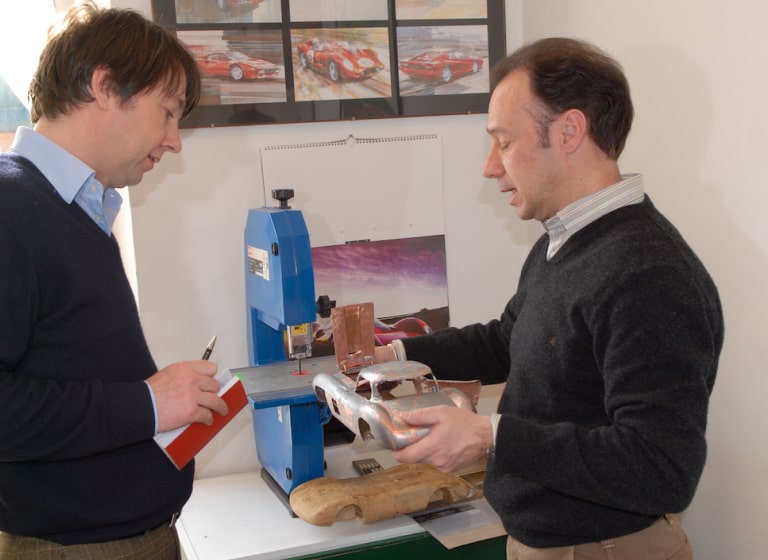 Mauritio Conti shows his handcrafted Ferrari 375MM model to Frank Paul Janssen